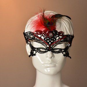Hand beaded masquerade mask with feather accent